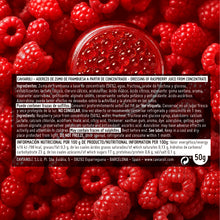 Cargar imagen en el visor de la galería, Caviaroli perlas de frambuesa en envase transparente rodeadas de frambuesas frescas.